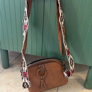 Stylish Brown Crossbody Bag with Patterned Strap